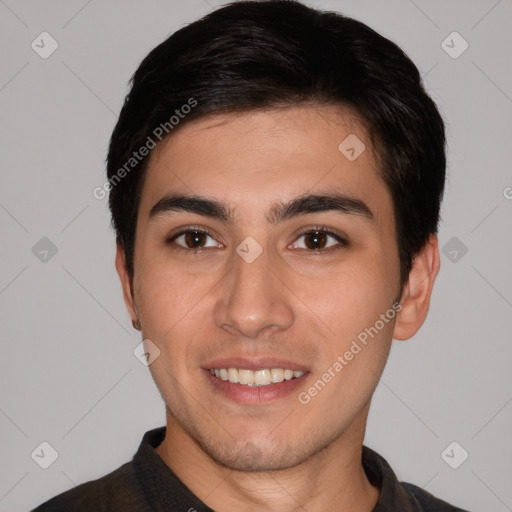 Joyful white young-adult male with short  black hair and brown eyes