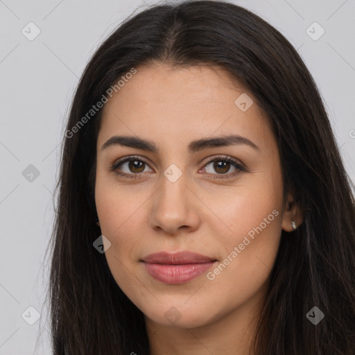 Joyful latino young-adult female with long  brown hair and brown eyes