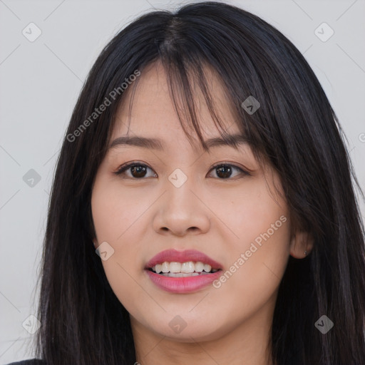 Joyful asian young-adult female with long  brown hair and brown eyes