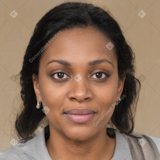 Joyful black young-adult female with medium  brown hair and brown eyes