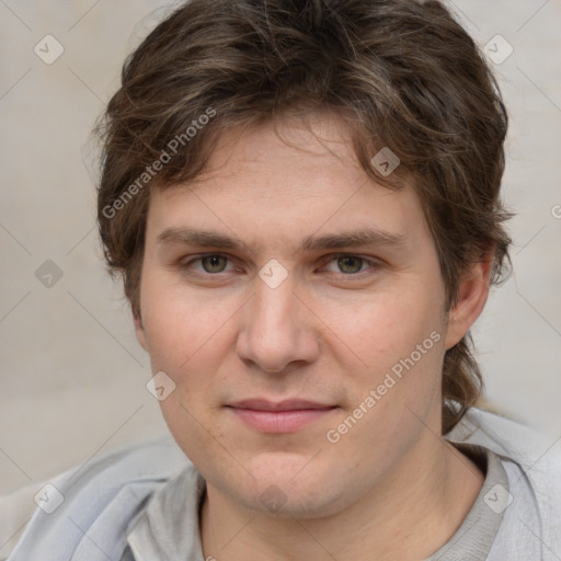 Joyful white young-adult male with medium  brown hair and brown eyes