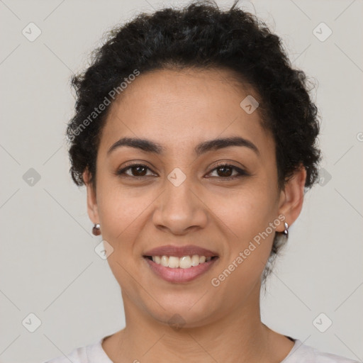 Joyful latino young-adult female with short  brown hair and brown eyes