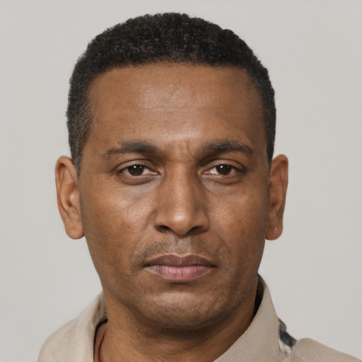 Neutral black adult male with short  black hair and brown eyes
