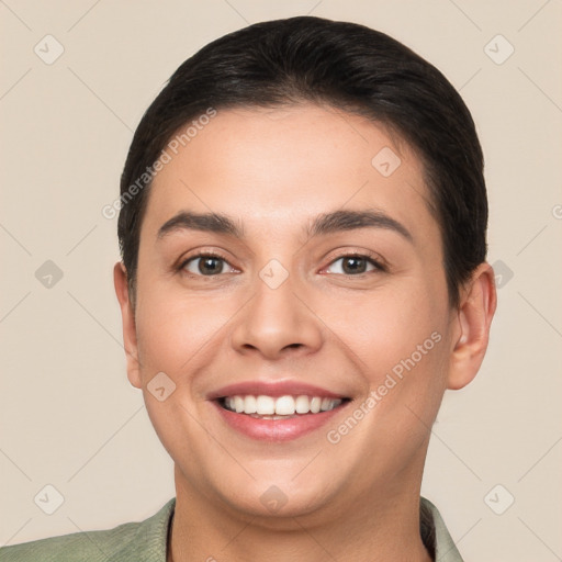 Joyful white young-adult female with short  brown hair and brown eyes