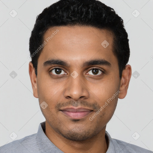 Joyful latino young-adult male with short  black hair and brown eyes