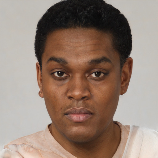 Neutral black young-adult male with short  black hair and brown eyes