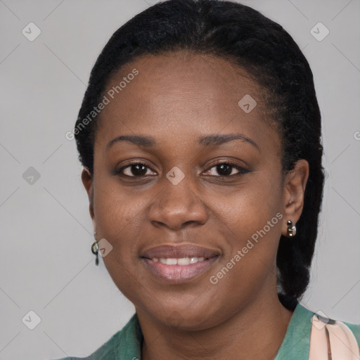 Joyful black young-adult female with short  black hair and brown eyes