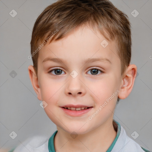 Joyful white child male with short  brown hair and brown eyes