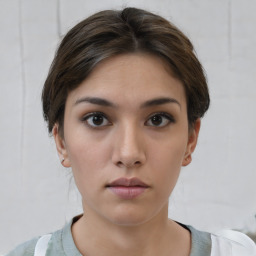 Neutral white young-adult female with short  brown hair and brown eyes