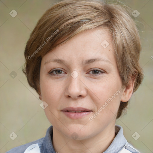 Joyful white adult female with medium  brown hair and grey eyes