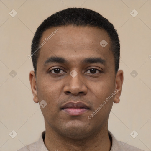 Neutral latino young-adult male with short  black hair and brown eyes