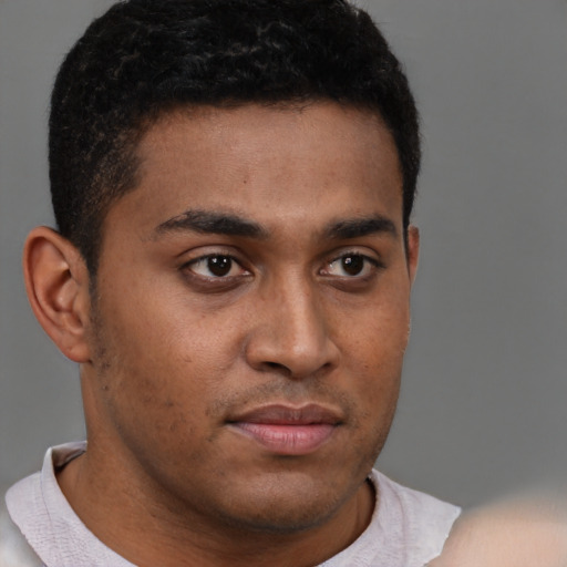 Neutral black young-adult male with short  brown hair and brown eyes