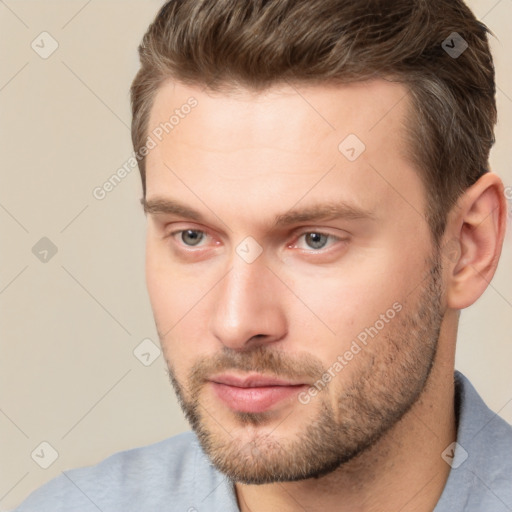 Neutral white young-adult male with short  brown hair and brown eyes