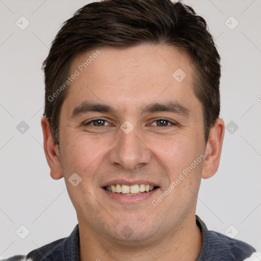 Joyful white young-adult male with short  brown hair and brown eyes