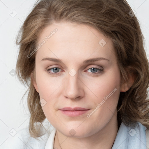 Joyful white young-adult female with medium  brown hair and blue eyes