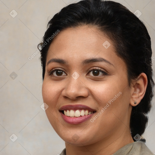 Joyful latino young-adult female with short  brown hair and brown eyes