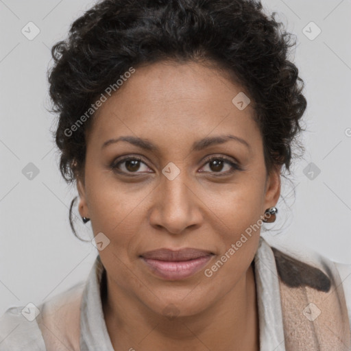 Joyful black adult female with short  brown hair and brown eyes