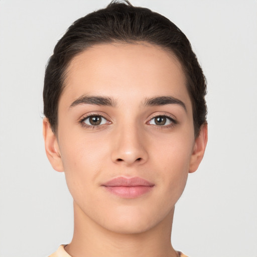 Neutral white young-adult female with short  brown hair and brown eyes