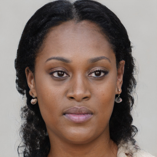 Neutral black young-adult female with long  black hair and brown eyes