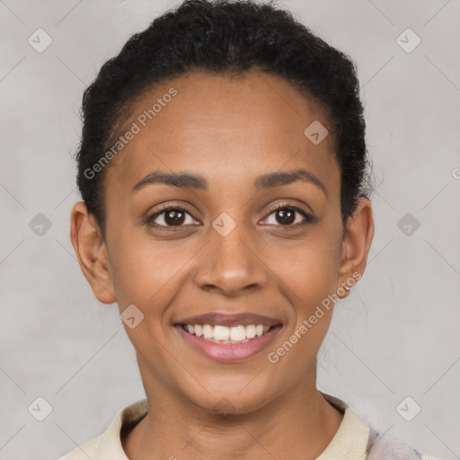 Joyful latino young-adult female with short  brown hair and brown eyes