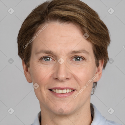 Joyful white adult male with short  brown hair and grey eyes