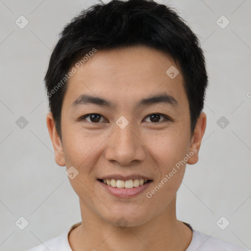 Joyful asian young-adult male with short  black hair and brown eyes