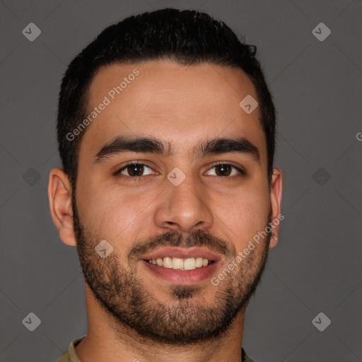 Joyful latino young-adult male with short  brown hair and brown eyes