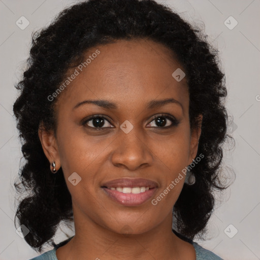 Joyful black young-adult female with medium  brown hair and brown eyes