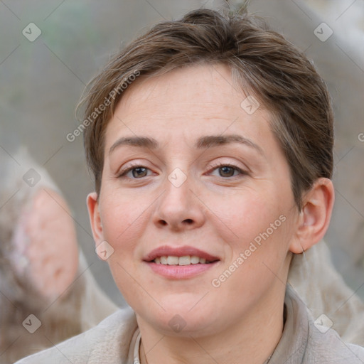 Joyful white young-adult female with medium  brown hair and blue eyes