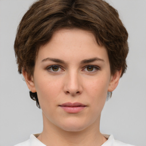 Neutral white young-adult female with short  brown hair and brown eyes