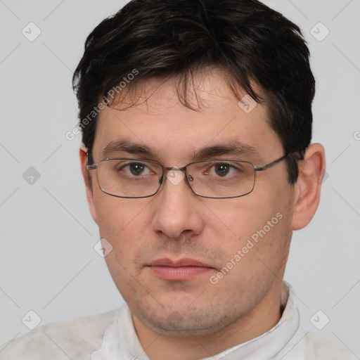 Neutral white adult male with short  brown hair and brown eyes