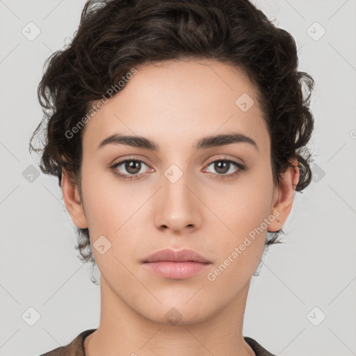 Neutral white young-adult female with short  brown hair and brown eyes