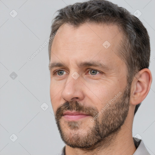 Neutral white adult male with short  brown hair and brown eyes