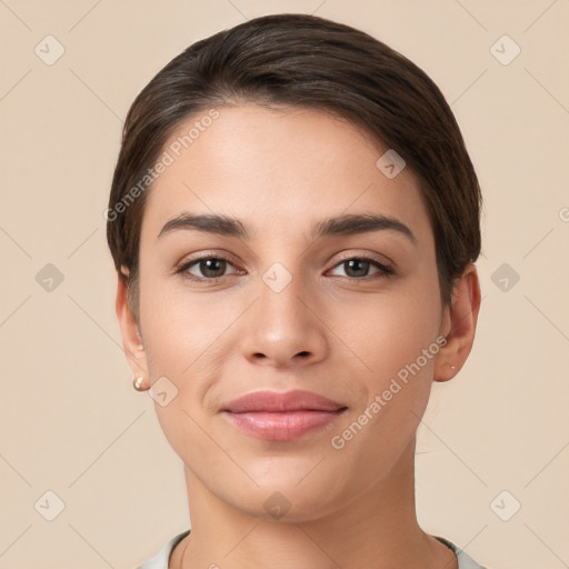 Joyful white young-adult female with short  brown hair and brown eyes