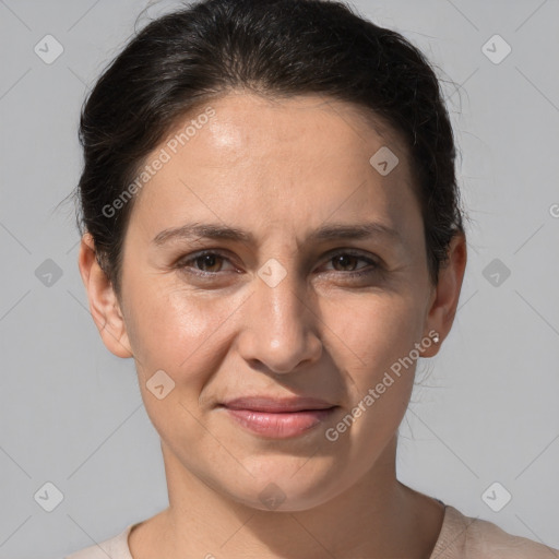 Joyful white adult female with short  brown hair and brown eyes