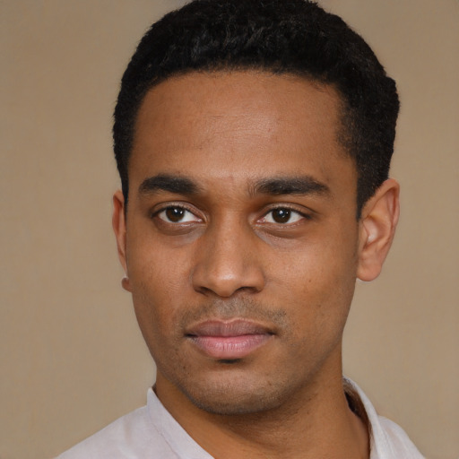 Neutral latino young-adult male with short  black hair and brown eyes