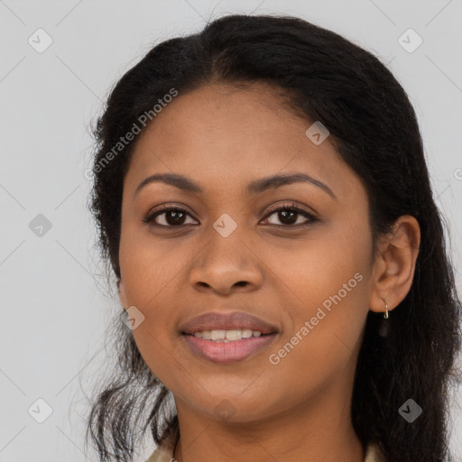 Joyful latino young-adult female with long  brown hair and brown eyes