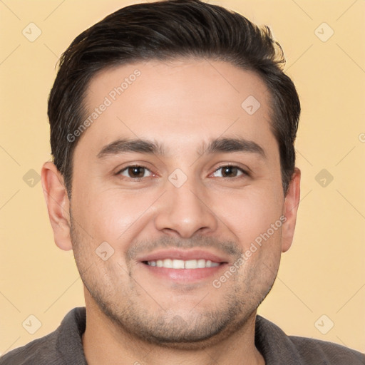 Joyful white young-adult male with short  brown hair and brown eyes