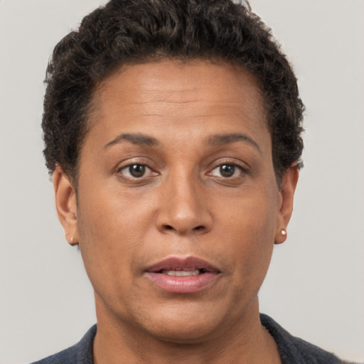 Neutral white adult female with short  brown hair and brown eyes
