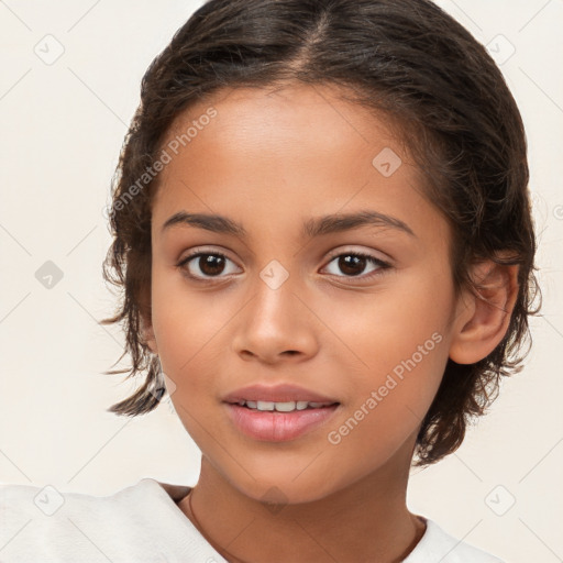 Joyful white child female with medium  brown hair and brown eyes