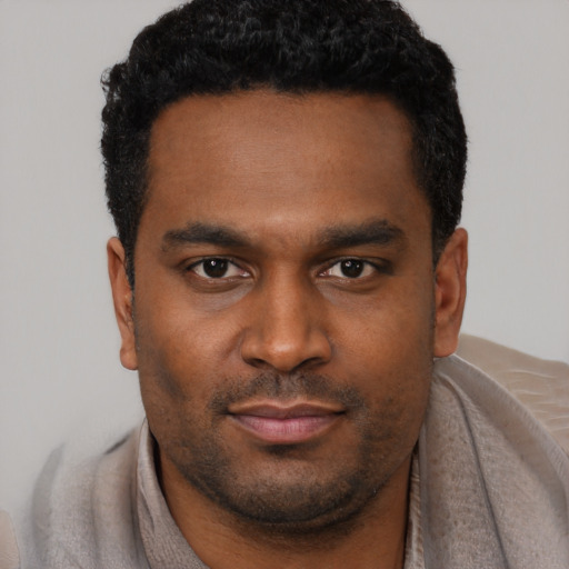 Neutral black young-adult male with short  brown hair and brown eyes