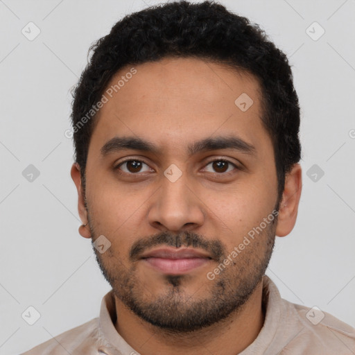 Neutral latino young-adult male with short  black hair and brown eyes