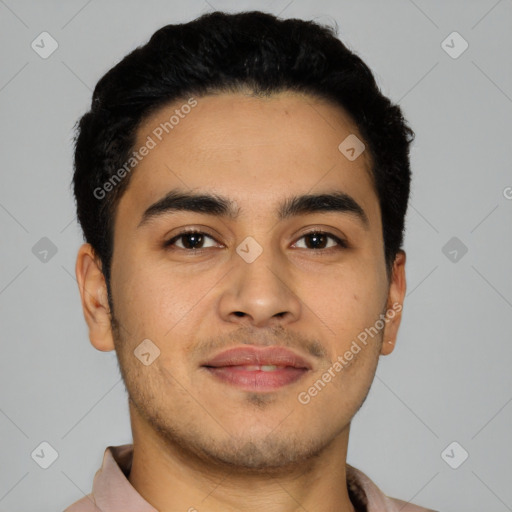 Joyful latino young-adult male with short  brown hair and brown eyes