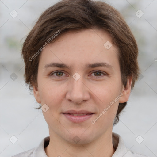 Joyful white young-adult female with short  brown hair and grey eyes