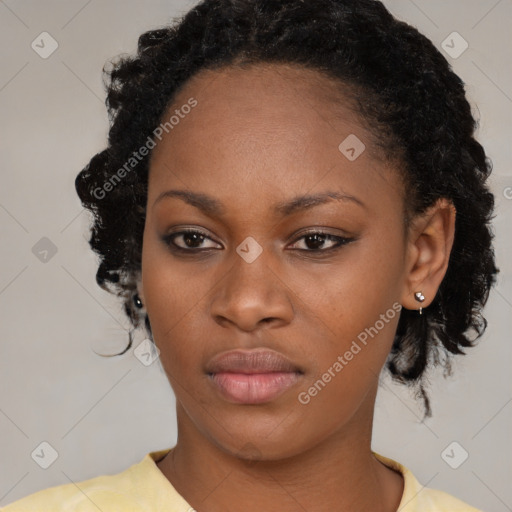 Neutral black young-adult female with medium  brown hair and brown eyes