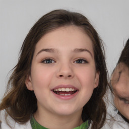 Joyful white child female with medium  brown hair and brown eyes