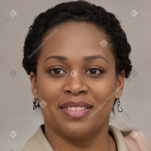 Joyful black young-adult female with short  brown hair and brown eyes