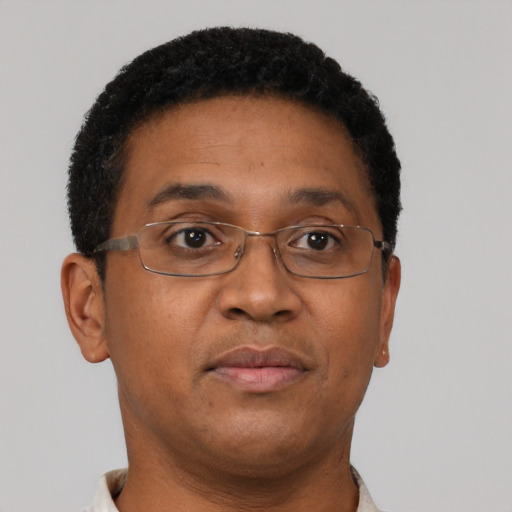 Neutral black young-adult male with short  brown hair and brown eyes