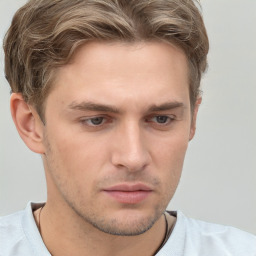 Neutral white young-adult male with short  brown hair and grey eyes