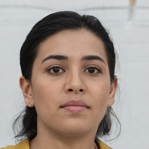 Neutral asian young-adult female with medium  brown hair and brown eyes